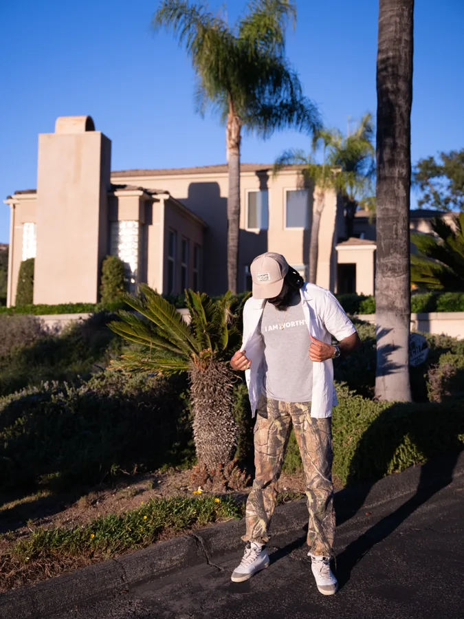 Fashion portrait with palms and architectural forms