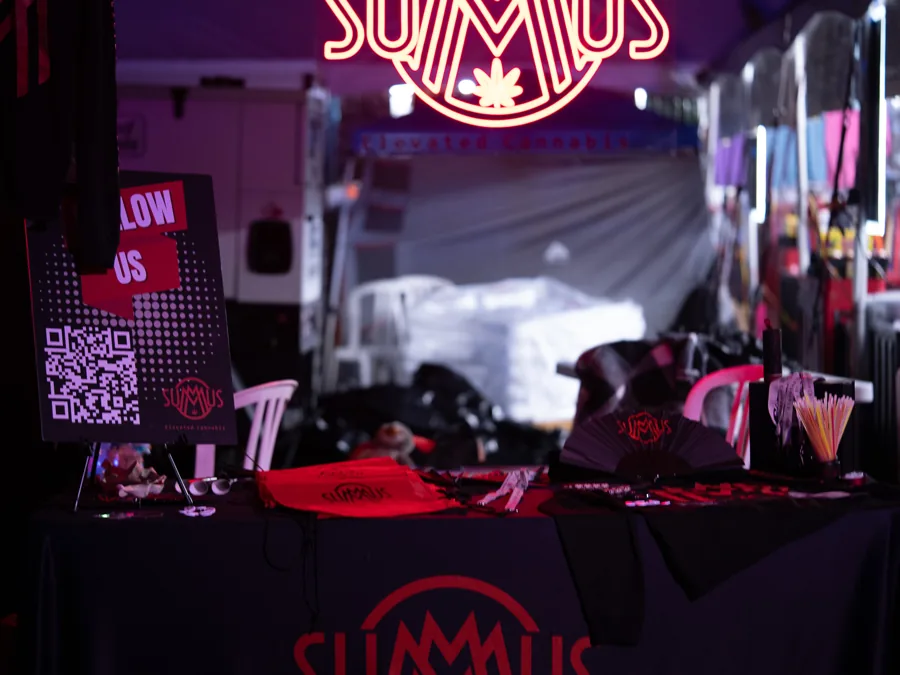 Merchandise booth illuminated by neon light
